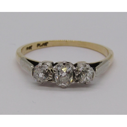 334 - 18ct three stone diamond ring in platinum setting, size L/M, 1.9g