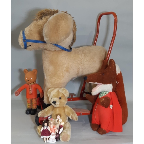 600A - Mixed toy lot including a vintage wheeled ride on donkey, a Basil Brush toy by Wendy Boston, Rupert ... 