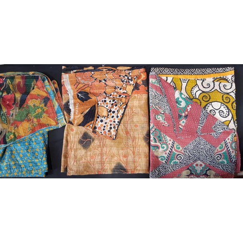 620 - 3 interesting reversible textile panels, each composed  of brightly patterned cotton pieces stitched... 