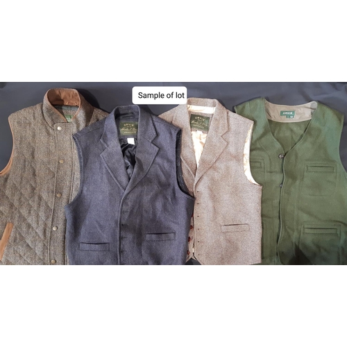 621 - A large collection of men's outdoor clothing including 4 waistcoats/gillets by Orvis in leather and ... 