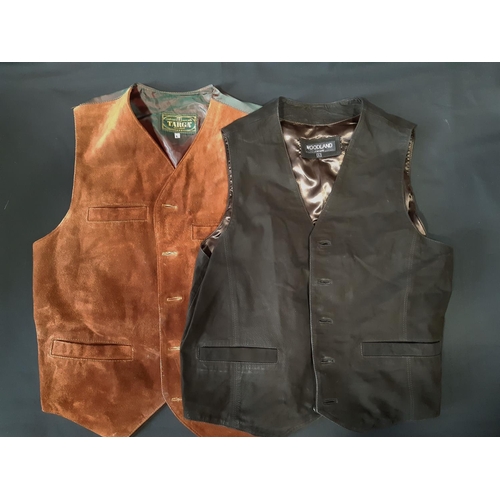 621 - A large collection of men's outdoor clothing including 4 waistcoats/gillets by Orvis in leather and ... 