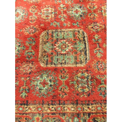 1783 - A machine made Wilton type carpet with two rows of elephant foot gul, 206cm x 140cm approx