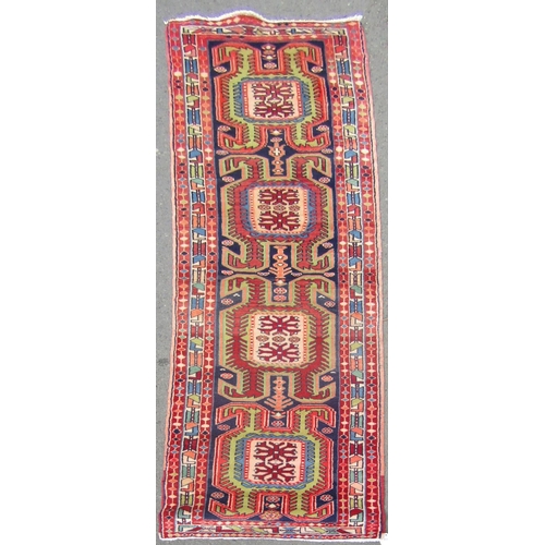 1788 - North west Persian Ardebil runner repeating hooked colourful medallions to centre in  290cm x 68cm a... 