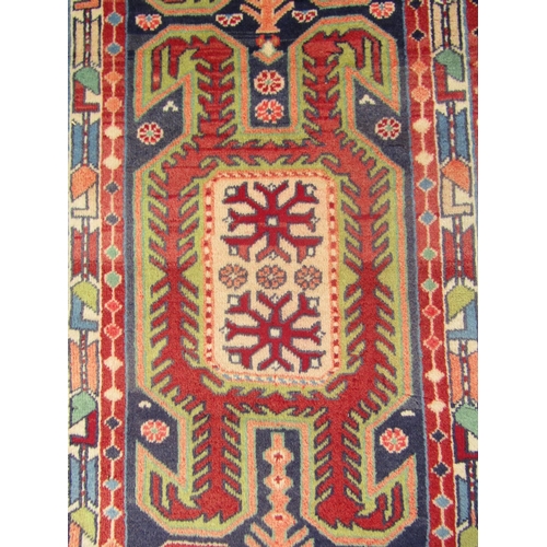 1788 - North west Persian Ardebil runner repeating hooked colourful medallions to centre in  290cm x 68cm a... 