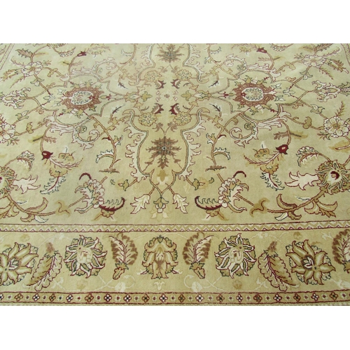 1793 - A large Ziegler design carpet with large floral palmettes on a beige ground, 370cm x 270cm approx