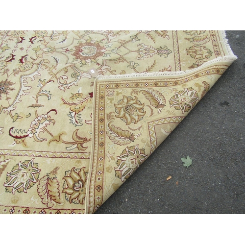 1793 - A large Ziegler design carpet with large floral palmettes on a beige ground, 370cm x 270cm approx