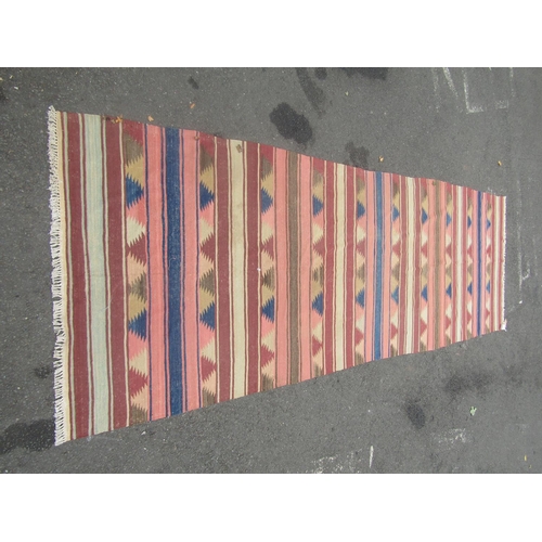 1800 - A large flat weave  Dhurrie carpet with repeating multi coloured horizontal stripe, 470cm x 160cm ap... 