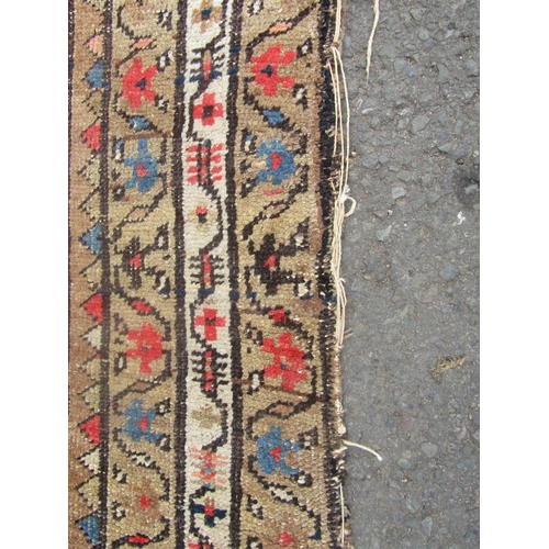 1801 - An Kazak design runner with a row of six gul to the centre 300cm x 95cm approx