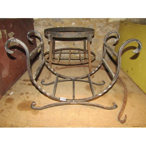 1139 - A steel cradle shaped log basket, a further ironwork stand of oval form, a collection of 19th centur... 