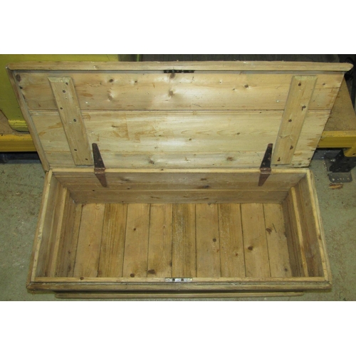 1140 - A 19th century pine blanket box with hinged lid and drop side ironwork carrying handles, (later pain... 