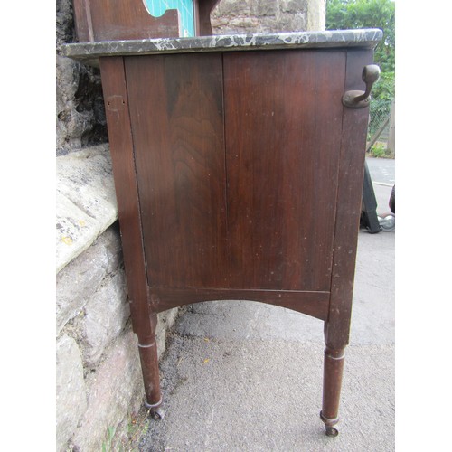 1613a - An arts and crafts walnut washstand with marble top and tiled splash back, the base enclosed by two ... 