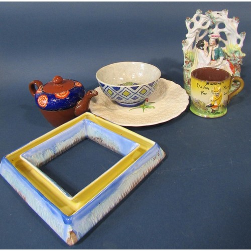 97a - A collection of miscellaneous ceramics to include a Staffordshire arbour group of a romantic couple,... 