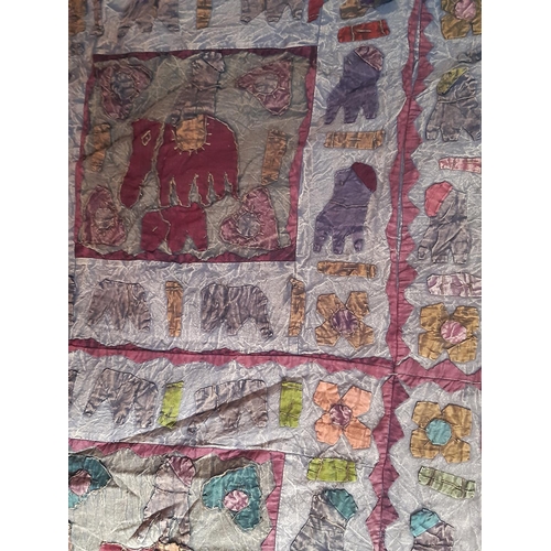 632 - Vintage Indian bedspread/ throw with elephant and flower motifs appliqued to a grey ground with dist... 