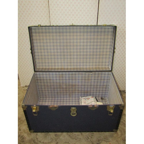 1258 - An overpond cabin trunk, together with two green painted tin trunks with drop side handles (3)