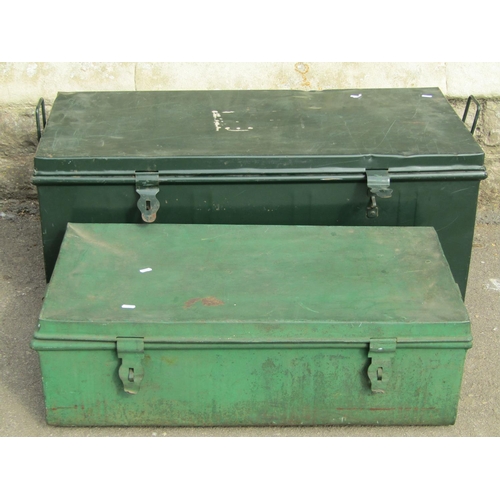 1258 - An overpond cabin trunk, together with two green painted tin trunks with drop side handles (3)