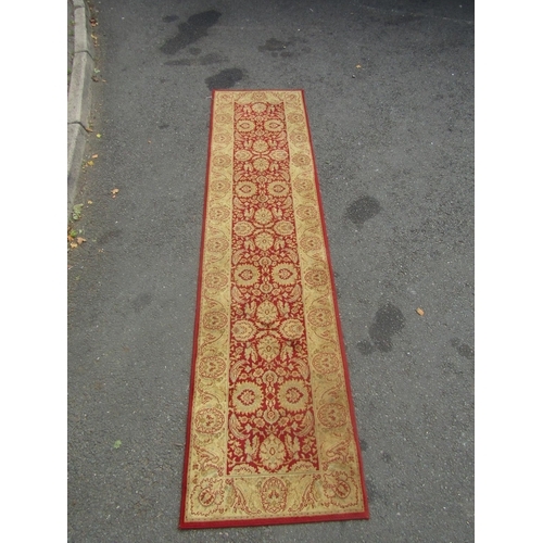 1818 - A Wilton type runner with a Middle Eastern pattern, 275cm x 64cm approx, and two further inter match... 