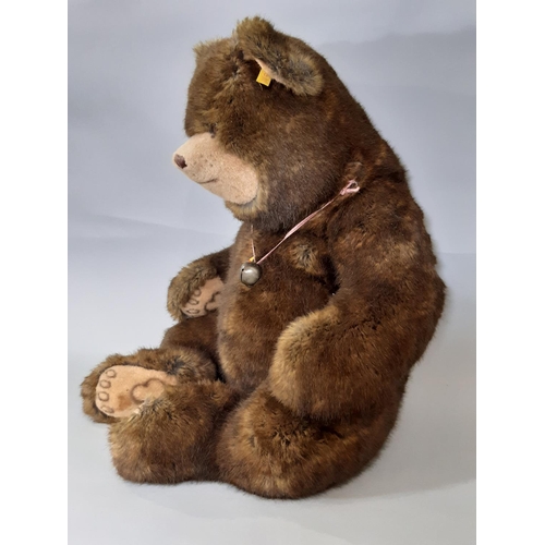 266 - Large sitting grizzly bear by Steiff with luxurious brown fur and tan muzzle, with tag and pin in ea... 