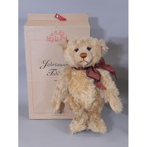 260 - Two Steiff toys 'Millennium Bear'  and 'Mungo'; teddy bear no 670374 has height 43cm with blonde moh... 