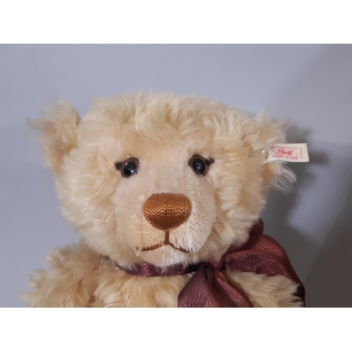 260 - Two Steiff toys 'Millennium Bear'  and 'Mungo'; teddy bear no 670374 has height 43cm with blonde moh... 