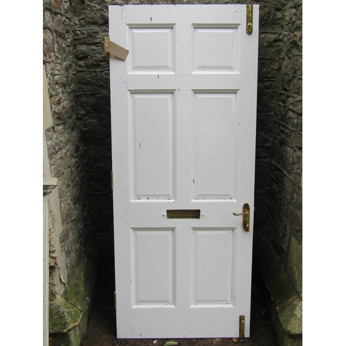 2039 - A good quality painted hardwood front door with fielded panels and polished brass fittings,  (comple... 