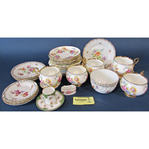 1016 - A collection of decorative floral pattern tea wares including Dresden example, Kent china ware, etc