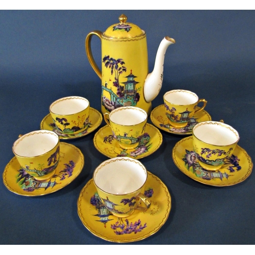 1025 - A New Chelsea coffee service with yellow ground and chinoiserie style detail