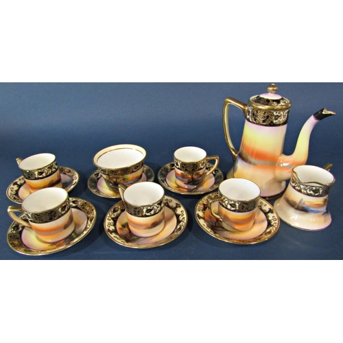 1055 - A Noritake coffee service with hand painted European style detail within repeating blue and gilt bor... 