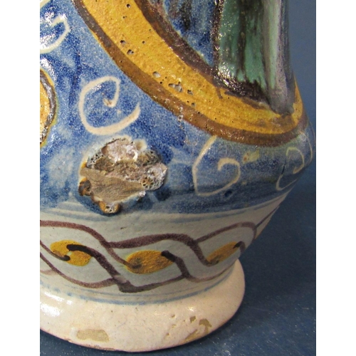 1041 - Continental majolica drug jar, the body of waisted form, with hand painted character and repeating s... 