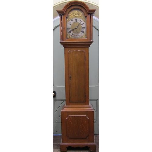 2634 - An early 19th century oak longcase clock, the hood with arched outline enclosing a broken arched gla... 