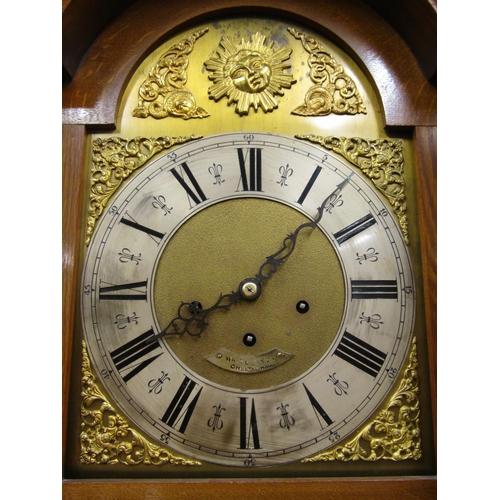 2634 - An early 19th century oak longcase clock, the hood with arched outline enclosing a broken arched gla... 