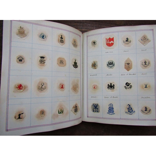 143 - An album of Crests and Arms plus a 19th century impression of the seal of the House of Commons. (1)