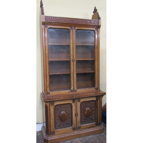 2758 - A good quality Victorian walnut country house library bookcase, the upper section enclosed by two gl... 