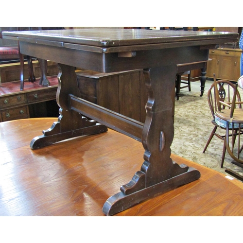 2342 - An Ercol draw leaf refectory table, together with six dining chairs with fleur de lys splats and a f... 