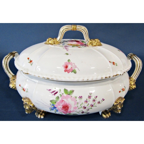 1053 - An early 19th century  Derby tureen and cover with floral sprays, raised on gilded lions mask and pa... 