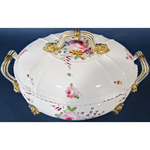 1053 - An early 19th century  Derby tureen and cover with floral sprays, raised on gilded lions mask and pa... 