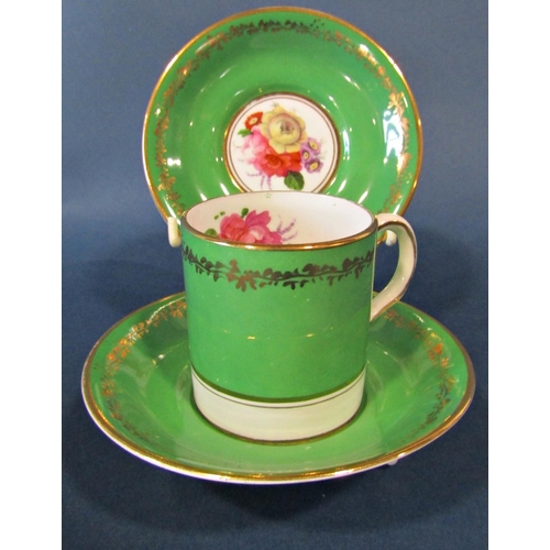 1055a - A set of twelve Allerton coffee cans and saucers with green ground with floral bouquet detail