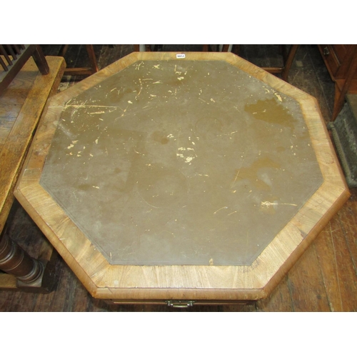 2452 - A Victorian mahogany centre table of octagonal form, with alternating real and dummy drawers, raised... 