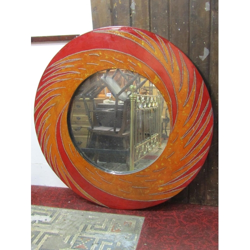 2467 - A large contemporary wall mirror of circular form with wide painted swirling patterned frame, 133cm ... 