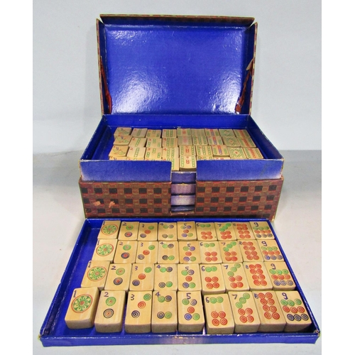 1658 - A complete set of Mahjong with bamboo tiles set over five trays in a cardboard box.