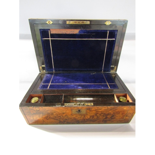 1666 - A 19th century burr walnut writing slope with a rounded off lid and brass stringing 41cm wide.