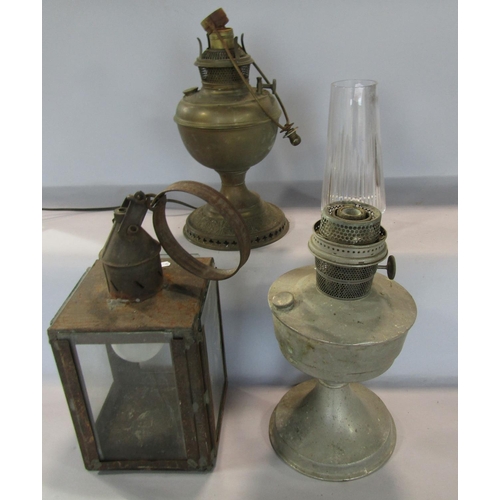 1673 - A black marble mantle clock with a Cavalier, three examples of vintage oil lamps and a mahogany fold... 