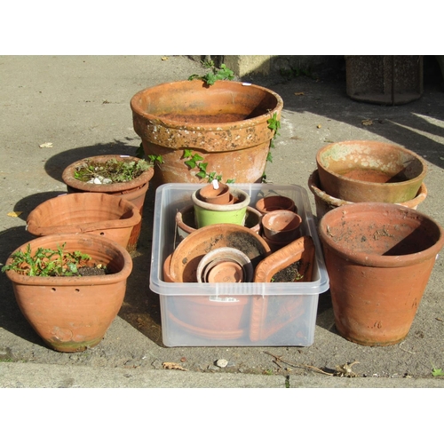 2024 - One lot of weathered terracotta flower pots and planters of varying size and design, largest example... 