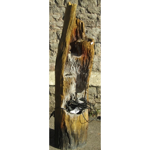 2033 - A contemporary composite cascading water feature in the form of a tree trunk, 122 cm high