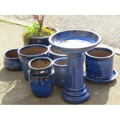 2036 - A collection of contemporary blue glazed planters of varying size and design