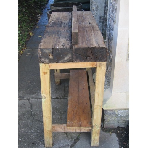 2040 - A rustic pine work bench 132 cm long x 50 cm wide x 100 cm high