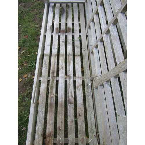 2069 - A pair of weathered teak Lutyens style three seat garden benches, 166 cm wide (af)