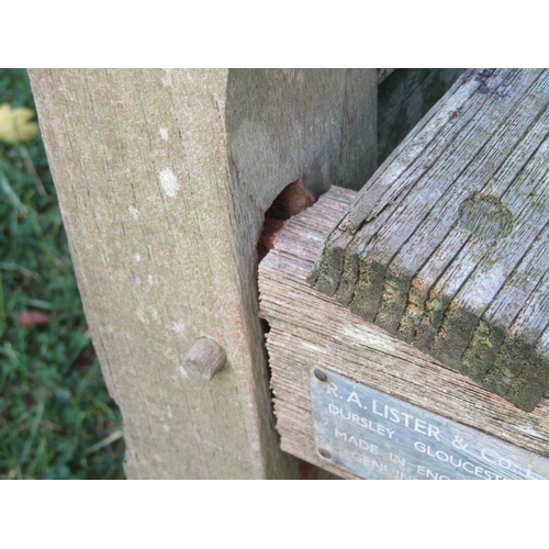 2071 - An R A Lister & Co Ltd well weathered teak garden/park bench 83 cm (6ft wide approx af)