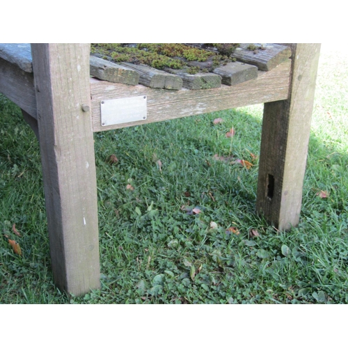 2071 - An R A Lister & Co Ltd well weathered teak garden/park bench 83 cm (6ft wide approx af)