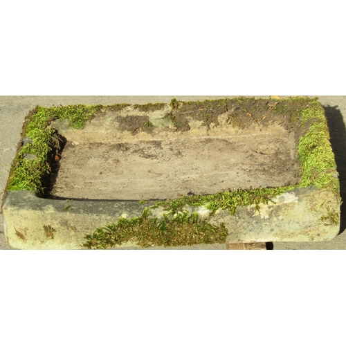 2104 - A weathered shallow thick walled rectangular natural stone sink/trough, 84cm long x 62cm wide x 15cm... 