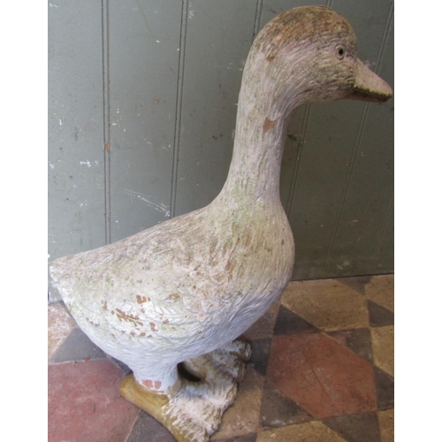 2115 - A painted terracotta garden ornament in the form of a goose, 48cm high